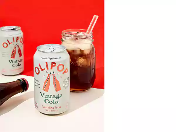 Cans of Olipop Vintage Cola